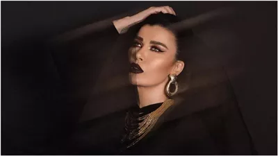نادين الراسي تستذكر شقيقها جورج على مسرح 